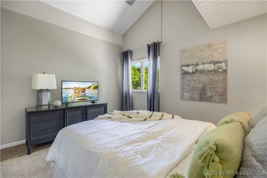 This magnificent 5-bedroom, 3-bathroom lakefront home is walking on The Oaks Golf Course in Missouri - for sale on GolfHomes.com, golf home, golf lot