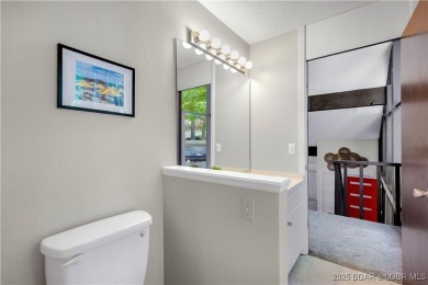 This magnificent 5-bedroom, 3-bathroom lakefront home is walking on The Oaks Golf Course in Missouri - for sale on GolfHomes.com, golf home, golf lot