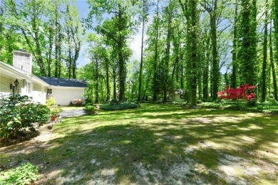 Welcome to a tranquil setting in a well-loved neighborhood! This on Forest Oaks Country Club in North Carolina - for sale on GolfHomes.com, golf home, golf lot