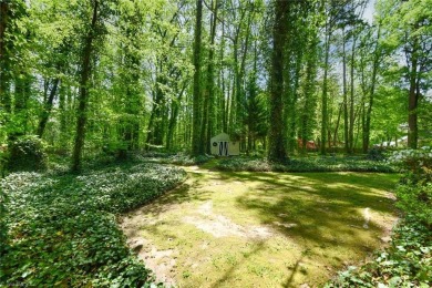 Welcome to a tranquil setting in a well-loved neighborhood! This on Forest Oaks Country Club in North Carolina - for sale on GolfHomes.com, golf home, golf lot