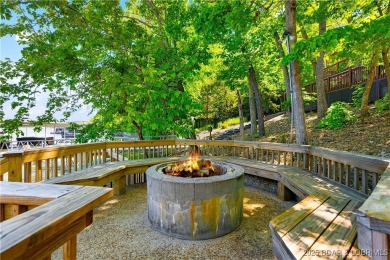 This magnificent 5-bedroom, 3-bathroom lakefront home is walking on The Oaks Golf Course in Missouri - for sale on GolfHomes.com, golf home, golf lot