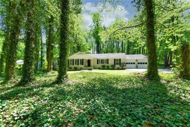 Welcome to a tranquil setting in a well-loved neighborhood! This on Forest Oaks Country Club in North Carolina - for sale on GolfHomes.com, golf home, golf lot