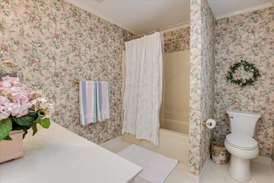 Discover this exceptional five-bedroom home featuring spacious on West Lake Country Club in Georgia - for sale on GolfHomes.com, golf home, golf lot