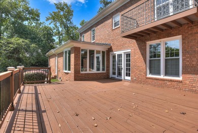Discover this exceptional five-bedroom home featuring spacious on West Lake Country Club in Georgia - for sale on GolfHomes.com, golf home, golf lot