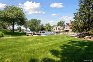 Welcome to your water oasis!  Beautiful all brick ranch with on Waters Edge Country Club in Michigan - for sale on GolfHomes.com, golf home, golf lot
