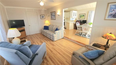 CHEERFUL HOME IN ACTIVE 55+ COMMUNITY! This one bed, 1 1/2 bath on River Run Golf Links in Florida - for sale on GolfHomes.com, golf home, golf lot