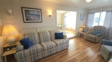 CHEERFUL HOME IN ACTIVE 55+ COMMUNITY! This one bed, 1 1/2 bath on River Run Golf Links in Florida - for sale on GolfHomes.com, golf home, golf lot