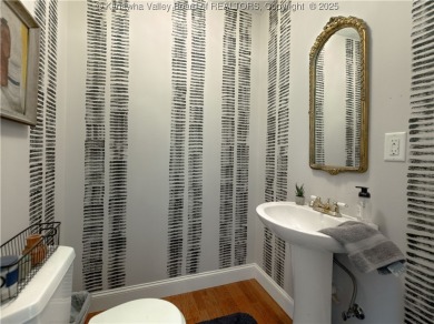 Welcome to this beautifully maintained 3-bedroom, 3 full bath on Twin Silos At Lavalette in West Virginia - for sale on GolfHomes.com, golf home, golf lot