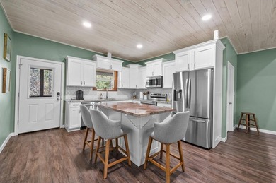 This beautifully appointed 3-bedroom, 2-bath home with a 2-car on Rayburn Country Club in Texas - for sale on GolfHomes.com, golf home, golf lot