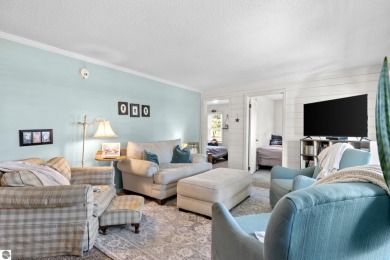 This four bedroom house with a double lot checks all the boxes on Elk Rapids Golf Club in Michigan - for sale on GolfHomes.com, golf home, golf lot