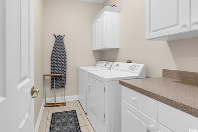 Welcome to this spacious and inviting three-bedroom, two-bath on Tupelo Bay Golf Complex  in South Carolina - for sale on GolfHomes.com, golf home, golf lot