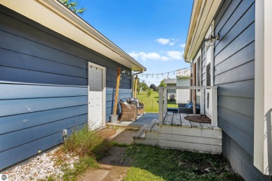 This four bedroom house with a double lot checks all the boxes on Elk Rapids Golf Club in Michigan - for sale on GolfHomes.com, golf home, golf lot