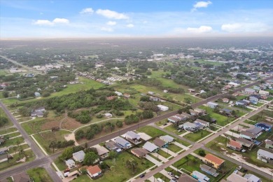 Welcome to this furnished 2-bedroom / 2-bathroom coastal bay on Rockport Country Club in Texas - for sale on GolfHomes.com, golf home, golf lot