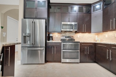 Welcome to 1123 Piccadilly Street in the gated community of on Old Palm Golf Club in Florida - for sale on GolfHomes.com, golf home, golf lot