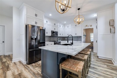 Welcome Home to 1045 Par Drive, located in the private gated on Sapelo Hammock Golf Club in Georgia - for sale on GolfHomes.com, golf home, golf lot