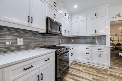 Welcome Home to 1045 Par Drive, located in the private gated on Sapelo Hammock Golf Club in Georgia - for sale on GolfHomes.com, golf home, golf lot