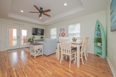 Welcome to this furnished 2-bedroom / 2-bathroom coastal bay on Rockport Country Club in Texas - for sale on GolfHomes.com, golf home, golf lot
