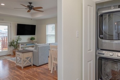 Welcome to this furnished 2-bedroom / 2-bathroom coastal bay on Rockport Country Club in Texas - for sale on GolfHomes.com, golf home, golf lot
