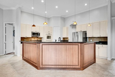 Stunning 4-bedroom + office, 3-bath home with 3,212 sq ft in the on Hammock Creek Golf Club in Florida - for sale on GolfHomes.com, golf home, golf lot