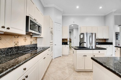 Stunning 4-bedroom + office, 3-bath home with 3,212 sq ft in the on Hammock Creek Golf Club in Florida - for sale on GolfHomes.com, golf home, golf lot