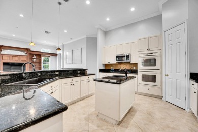Stunning 4-bedroom + office, 3-bath home with 3,212 sq ft in the on Hammock Creek Golf Club in Florida - for sale on GolfHomes.com, golf home, golf lot