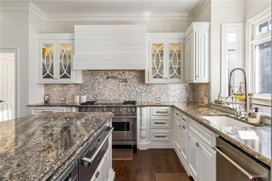 An extraordinary expression of refined luxury and warmth, this on TPC At Sugarloaf Golf Club in Georgia - for sale on GolfHomes.com, golf home, golf lot