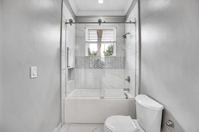 Stunning 4-bedroom + office, 3-bath home with 3,212 sq ft in the on Hammock Creek Golf Club in Florida - for sale on GolfHomes.com, golf home, golf lot