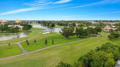 Experience the elegance of this remodeled 2/2 + DEN Villa in on Bonaventure Country Club in Florida - for sale on GolfHomes.com, golf home, golf lot