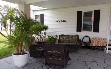 When entering this gorgeous 2-bedroom, 2-bath Palm Harbor Home on Schalamar Creek Golf and Country Club in Florida - for sale on GolfHomes.com, golf home, golf lot