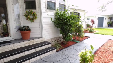 When entering this gorgeous 2-bedroom, 2-bath Palm Harbor Home on Schalamar Creek Golf and Country Club in Florida - for sale on GolfHomes.com, golf home, golf lot