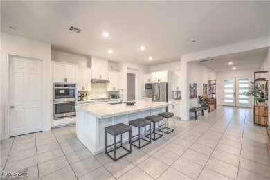 Experience refined resort-style living in this elegant on Reflection Bay Golf Club in Nevada - for sale on GolfHomes.com, golf home, golf lot