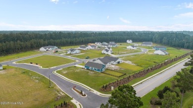 The Coventry welcomes you home. This newly-constructed 3-bedroom on Carolina Colours Golf Club in North Carolina - for sale on GolfHomes.com, golf home, golf lot