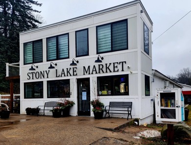 Tucked between Silver Lake and Stony Lake and just minutes from on Benona Shores Golf Course in Michigan - for sale on GolfHomes.com, golf home, golf lot