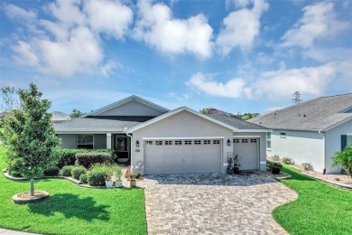 A Paver Driveway  Sidewalk welcome you to this Modern Affordable on Arlington Ridge Golf Club in Florida - for sale on GolfHomes.com, golf home, golf lot