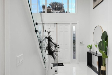 Contemporary renovation just completed on this well located on The Wanderers Club in Florida - for sale on GolfHomes.com, golf home, golf lot