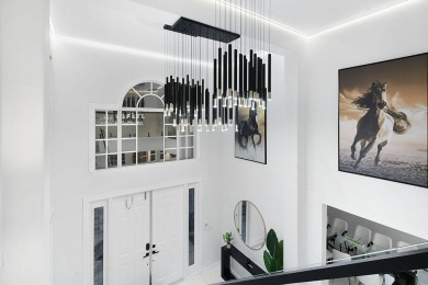 Contemporary renovation just completed on this well located on The Wanderers Club in Florida - for sale on GolfHomes.com, golf home, golf lot