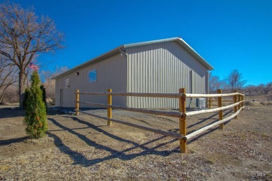 This stunning home in the Gated community Kanaka Rapids blends on Clear Lake Country Club in Idaho - for sale on GolfHomes.com, golf home, golf lot