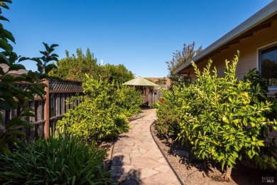 This well maintained Juniper residence is on a quiet street in on Oakmont Golf Club in California - for sale on GolfHomes.com, golf home, golf lot