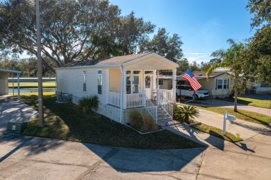 MOVE RIGHT INTO THIS BEAUTIFUL HOME WITH LVP THRU OUT, TRAY on Golden Lakes Golf Course in Florida - for sale on GolfHomes.com, golf home, golf lot