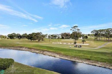 TOP FLOOR PENTHOUSE WITH A PANORAMIC LAKE & GOLF VIEW.  LONG on Oriole Golf and Tennis Club in Florida - for sale on GolfHomes.com, golf home, golf lot