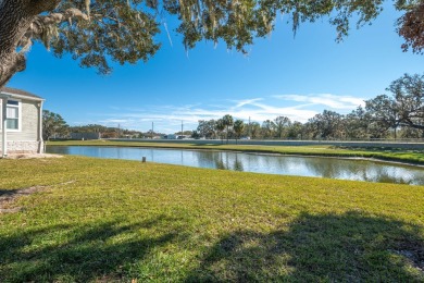 MOVE RIGHT INTO THIS BEAUTIFUL HOME WITH LVP THRU OUT, TRAY on Golden Lakes Golf Course in Florida - for sale on GolfHomes.com, golf home, golf lot