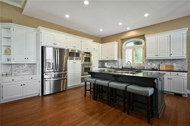 Looking lovely in Leawood is this 1.5 story home with a on Ironhorse Golf Club in Kansas - for sale on GolfHomes.com, golf home, golf lot