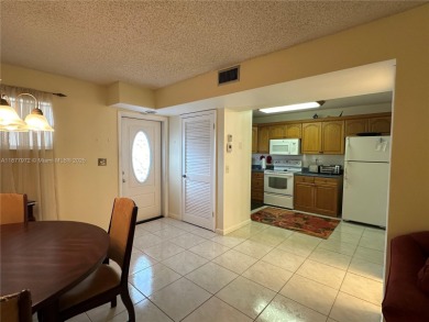 Cozy one bedroom, one and a half bathroom condo nestled within on Hollybrook Golf and Tennis Club  in Florida - for sale on GolfHomes.com, golf home, golf lot