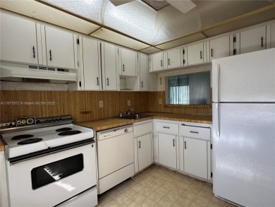 Cozy one bedroom, one and a half bathroom condo nestled within on Hollybrook Golf and Tennis Club  in Florida - for sale on GolfHomes.com, golf home, golf lot