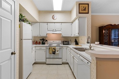 This charming and meticulously maintained 2-bedroom, 2-bathroom on Haile Plantation Golf and Country Club in Florida - for sale on GolfHomes.com, golf home, golf lot