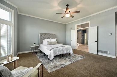 Looking lovely in Leawood is this 1.5 story home with a on Ironhorse Golf Club in Kansas - for sale on GolfHomes.com, golf home, golf lot