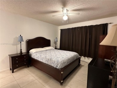Cozy one bedroom, one and a half bathroom condo nestled within on Hollybrook Golf and Tennis Club  in Florida - for sale on GolfHomes.com, golf home, golf lot