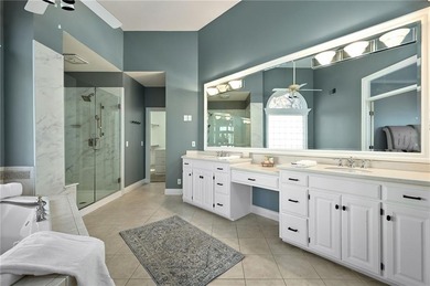 Looking lovely in Leawood is this 1.5 story home with a on Ironhorse Golf Club in Kansas - for sale on GolfHomes.com, golf home, golf lot