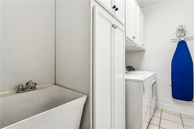 Beautifully updated home on the 12th tee box of Oak Harbor Golf on Oak Harbor Golf Club in Louisiana - for sale on GolfHomes.com, golf home, golf lot