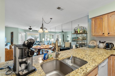 This cozy 2 bedroom 2 bath condo is nestled right on Brick on Brick Landing Plantation Yacht and Golf Club in North Carolina - for sale on GolfHomes.com, golf home, golf lot